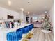 Festive kitchen decorated for the holidays, with a Christmas tree and cozy atmosphere at 15720 Sw 19Th Ter, Ocala, FL 34473
