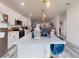 Modern kitchen with white cabinets, stainless steel appliances, and a large island perfect for entertaining at 15720 Sw 19Th Ter, Ocala, FL 34473