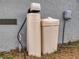 Water softener and filtration system against the exterior wall of a home at 15720 Sw 19Th Ter, Ocala, FL 34473