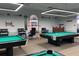 Relaxing billiards room with two pool tables at 17973 Se 104Th Ter, Summerfield, FL 34491