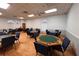 Community game room with multiple tables and chairs at 17973 Se 104Th Ter, Summerfield, FL 34491