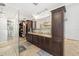 Main bathroom boasting double vanity, large mirror, and modern fixtures at 2023 Se Laurel Run Dr, Ocala, FL 34471