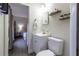Clean bathroom with white vanity, toilet and shower at 41 Hickory Trak, Ocala, FL 34472
