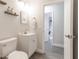 Updated bathroom with white vanity and toilet at 41 Hickory Trak, Ocala, FL 34472