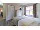 Well-lit bedroom with white dresser and large window at 41 Hickory Trak, Ocala, FL 34472