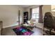Bright bedroom with a comfortable armchair and workspace at 41 Hickory Trak, Ocala, FL 34472