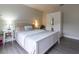 Bright bedroom with a white bed frame and built-in wardrobe at 41 Hickory Trak, Ocala, FL 34472