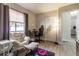 Cozy bedroom featuring a comfy chair and a workspace at 41 Hickory Trak, Ocala, FL 34472