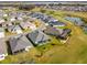 Aerial view of homes near golf course at 4522 Shockoe Cir, The Villages, FL 32163