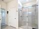 Modern bathroom with a walk-in shower with glass door and tiled walls at 5268 Nw 46Th Lane Rd, Ocala, FL 34482