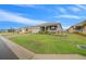 Single-story home with a front yard and attached two-car garage at 7932 Sw 89Th Cir, Ocala, FL 34481
