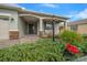 Inviting front porch with stone accents and a cozy sitting area at 7932 Sw 89Th Cir, Ocala, FL 34481