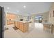 Open kitchen with island, stainless steel appliances, and plenty of counter space at 7932 Sw 89Th Cir, Ocala, FL 34481
