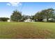 Large backyard with home and outbuildings at 14136 Sw 8Th Ave, Ocala, FL 34473