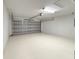 Two-car garage with white walls and floor at 17752 Sw 36Th Loop, Dunnellon, FL 34432