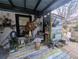 Whimsical backyard patio with colorful painted wood planks at 18695 Ne 5Th Terrace Rd, Citra, FL 32113