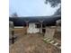 Wooden barn with stalls and fenced area at 18695 Ne 5Th Terrace Rd, Citra, FL 32113