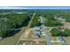 High-angle view of new construction homes, roads, and wooded areas at 281 Locust Pass, Ocala, FL 34472