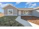 Front exterior view of a new construction single Gathering home at 281 Locust Pass, Ocala, FL 34472