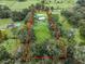 Aerial view of a property with a house and large lot at 3505 Ne 97Th Street Rd, Anthony, FL 32617