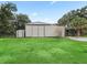 Metal barn with attached shed and covered stalls at 3505 Ne 97Th Street Rd, Anthony, FL 32617