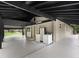Covered patio with access to the laundry room and backyard at 3505 Ne 97Th Street Rd, Anthony, FL 32617