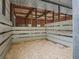 Individual horse stall with wood and metal details at 3505 Ne 97Th Street Rd, Anthony, FL 32617