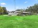 Single story home with large yard and attached carport at 3505 Ne 97Th Street Rd, Anthony, FL 32617