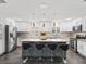 Modern kitchen with white cabinets, granite countertops, and island at 3505 Ne 97Th Street Rd, Anthony, FL 32617