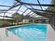 Refreshing screened pool with ample space for swimming and sunbathing at 3505 Ne 97Th Street Rd, Anthony, FL 32617