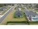 An aerial view of a home with a large backyard, surrounded by a lush green lawn at 3810 Se 4Th Ter, Ocala, FL 34480