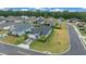 Aerial view of a light blue house on a corner lot at 3810 Se 4Th Ter, Ocala, FL 34480