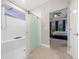 Modern bathroom with a large walk-in shower and bedroom view at 3810 Se 4Th Ter, Ocala, FL 34480