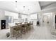 Modern kitchen with stainless steel appliances, an island, and plenty of cabinet space at 3810 Se 4Th Ter, Ocala, FL 34480