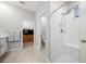 Spa-like shower with built-in seat and glass enclosure at 3810 Se 4Th Ter, Ocala, FL 34480