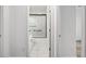 Clean bathroom with white vanity, bathtub, and marble-tiled shower at 39926 Parkinsonia St, Lady Lake, FL 32159