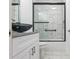 Updated bathroom, featuring a walk-in shower and new vanity at 39926 Parkinsonia St, Lady Lake, FL 32159