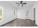 Bedroom with ceiling fan and exterior access at 39926 Parkinsonia St, Lady Lake, FL 32159