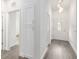 Bright entryway with white cabinets and wood-look flooring at 39926 Parkinsonia St, Lady Lake, FL 32159