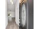 Bright entryway with hardwood floors and view of living room at 39926 Parkinsonia St, Lady Lake, FL 32159