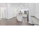 Modern kitchen with white cabinets and stylish backsplash at 39926 Parkinsonia St, Lady Lake, FL 32159