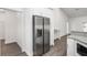 Modern kitchen with stainless steel appliances and white cabinets at 39926 Parkinsonia St, Lady Lake, FL 32159