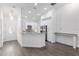 Modern kitchen with white cabinets and a stylish backsplash at 39926 Parkinsonia St, Lady Lake, FL 32159