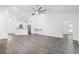 Open concept kitchen with white cabinets and modern appliances at 39926 Parkinsonia St, Lady Lake, FL 32159