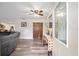 Entryway with wood-look floors, console table, and ceiling fan at 4191 Ne 132Nd Pl, Anthony, FL 32617