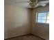 Simple bedroom with window and carpeted floor at 580 Fairways Ln # G204, Ocala, FL 34472