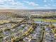 Aerial perspective of a golf course community at sunset at 7102 Sw 91St Ct, Ocala, FL 34481