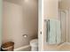 Simple bathroom with toilet, shower, and updated fixtures at 7102 Sw 91St Ct, Ocala, FL 34481