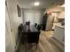 Dining area with table, chairs, and view of the kitchen with stainless steel appliances at 8788 Se 88Th Pl, Ocala, FL 34472