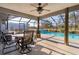 Relaxing pool area with screened patio and outdoor dining at 10120 Sw 49Th Ave, Ocala, FL 34476